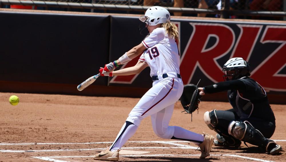 Arizona's Jessie Harper hits the ball to the outfield during the Arizona-Oregon State game at the Rita Hillenbrand Memorial Stadium on Sunday April 29 in Tucson Ariz.