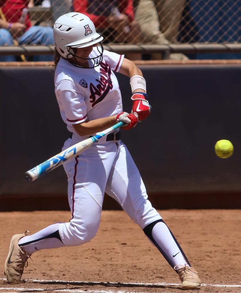 Arizona's Jessie Harper hits the incoming ball from Oregon during the third inning of the Arizona-Oregon State game at the Rita Hillenbrand Memorial Stadium on Sunday, April 29 in Tucson Ariz.