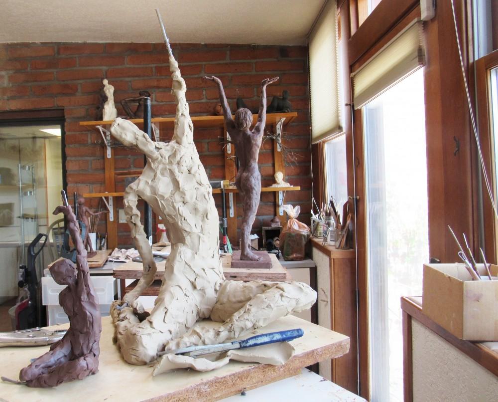 Sculptures by Neil Weinstein sit in his home studio in Tucson, Ariz. Neil uses UA dance students to inspire his sculptures.