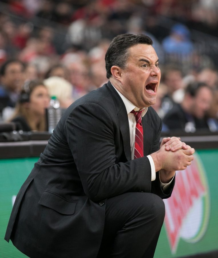 Arizona mens basketball head coach Sean Miller shouts a play onto the court in the Arizona-USC Championship game at the 2018 Pac-12 Tournament on Saturday, March 10 in T-Mobile Arena in Las Vegas, Nev.