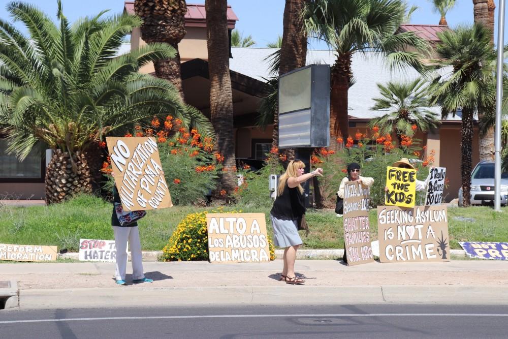 Protestors outside a Southwest Key shelter where 250-300 undocumented children are being held on N. Oracle Road on Thursday, June 28, 2018 in Tucson, Ariz. 