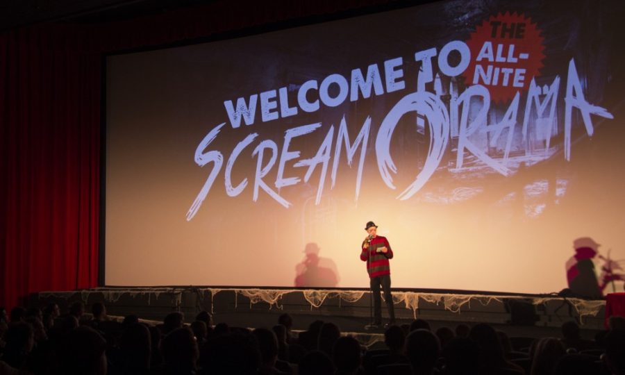 Program+Director+of+The+Loft+Cinema%2C+Jeff+Yanc%2C+speaks+with+the+crowd+about+the+Scream-O-Rama+and+introduces+the+first+scary+movie+on+June+1.