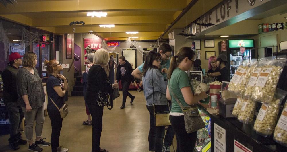 People wait in line at the concession stand while the Scream-O-Rama is going at The Loft Cinema on June 1. 