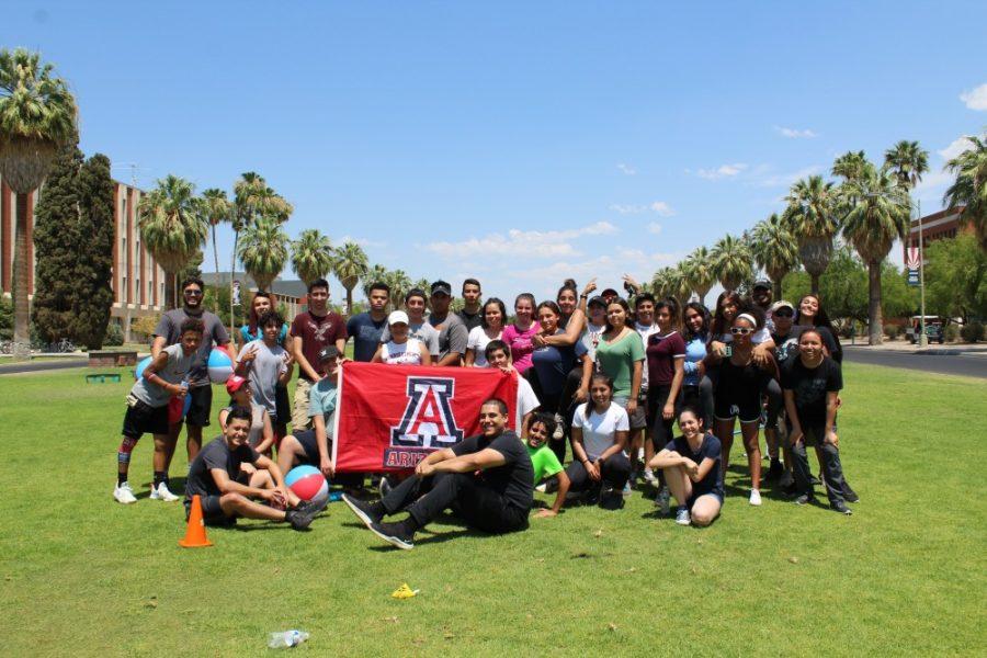 The Upward Bound program pose for a picture on the UA Mall. The program supports low-income high school students and helps them transition to campus life.