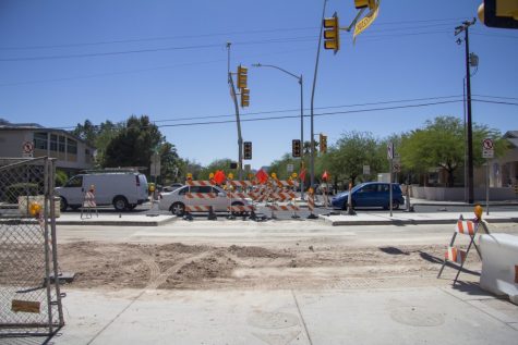 Vehicles pass each other in one lanes between University Blvd and 6th St due to construction on Euclid Ave on June 1.