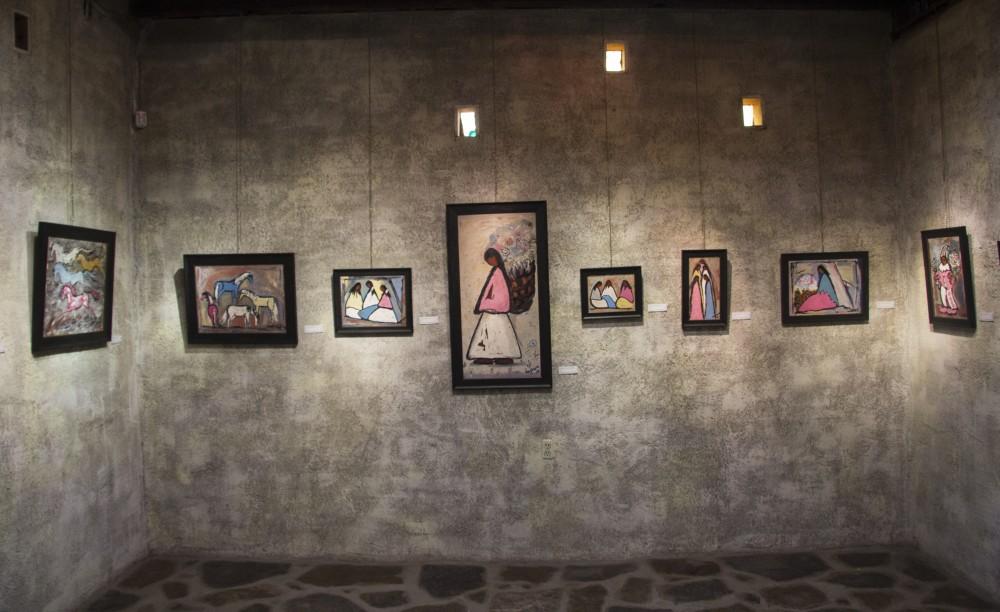 Ettore "Ted" DeGrazia paintings are seen hanging in his gallery that have been open since 1965. 