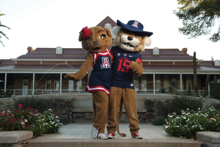 University of Arizona mascots Wilbur and Wilma Wildcats pose for a photo outside of Old Main on campus.