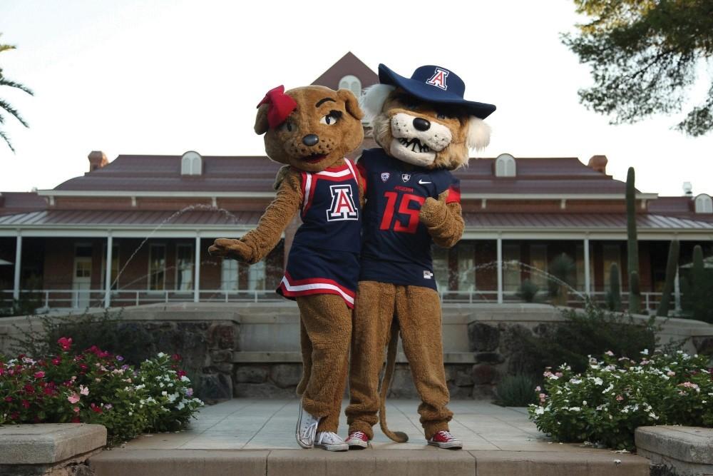 University of Arizona mascots Wilbur and Wilma Wildcat's pose for a photo outside of Old Main on campus.