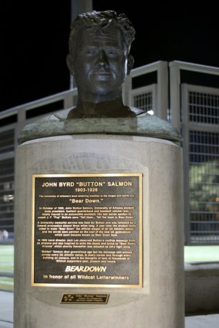 A bust of John "Button" Salmon sits on a pedestal outside Arizona Stadium. Salmon's famous advice for Pop McKale and the Arizona football team, "Tell them ... tell the team to bear down," still stands as a motto and way of life for Wildcats.