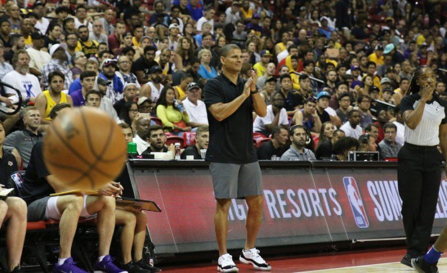 Los Angeles Lakers head coach Miles Simon claps on the sidelines during a Summer League game against the Philadelphia 76ers on July 7, 2018 at the Thomas & Mack Center in Las Vegas, Nev. 