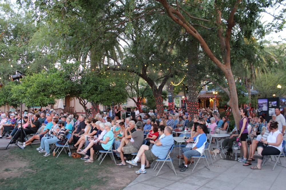 The audience at one of the free jazz concerts held every other Friday evening at Main Gate Square. These concerts are a chance for patrons to eat, drink and relax on University Boulevard accompanied by great jazz music.