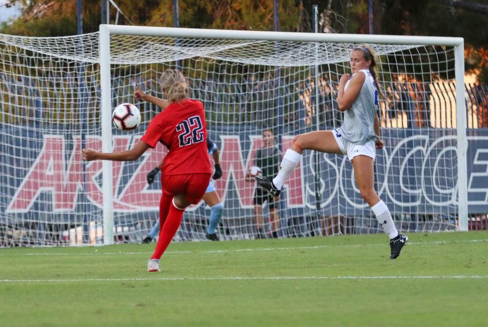 Arizona's Jada Talley (22) shoots the ball during the Arizona-Houston Baptist game on Sunday Aug. 26 at the Mulachy Stadium in Tucson, Ariz. Jada scored two out of the Wildcat's six goals during the game.