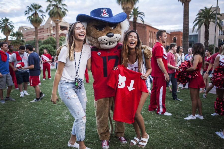 Freshmen smile with Wilbur T. Wildcat during the Bigger Better Bash in 2017.