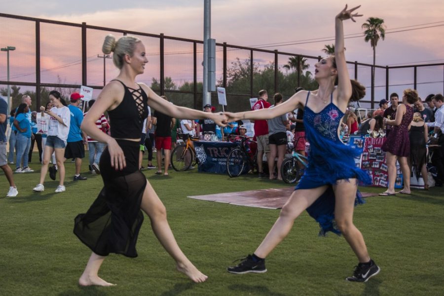 Taylor Burghard (left) and Tori Esposito (right) dance during the Bash at the Rec event. Taylor and Tori are apart of the Wildcat Dancesport, the official Ballroom Dance Team of the UA. 