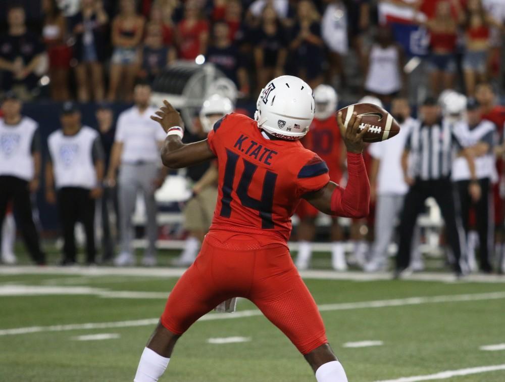 Arizona's Khalil Tate aims the football before throwing it during the third quarter of the UA vs. BYU game. 