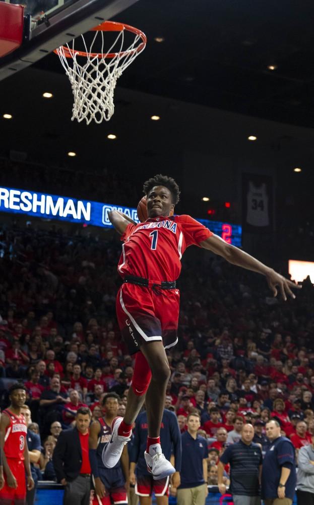 Arizona's Devonaire Doutrive, 1, participates in the dunk contest portion of the Red-Blue game on Sunday, Oct. 14 at the McKale Center in Tucson, Ariz.
