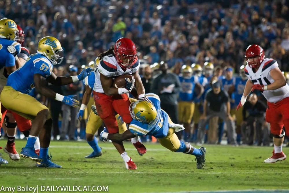 Wildcat Gary Brightwell (23) runs towards the end zone during the Arizona-UCLA game at Spieker Field on Oct. 20, 2018 at the Rose Bowl in Pasadena, CA. The game ended with the Wildcats losing 31-30.