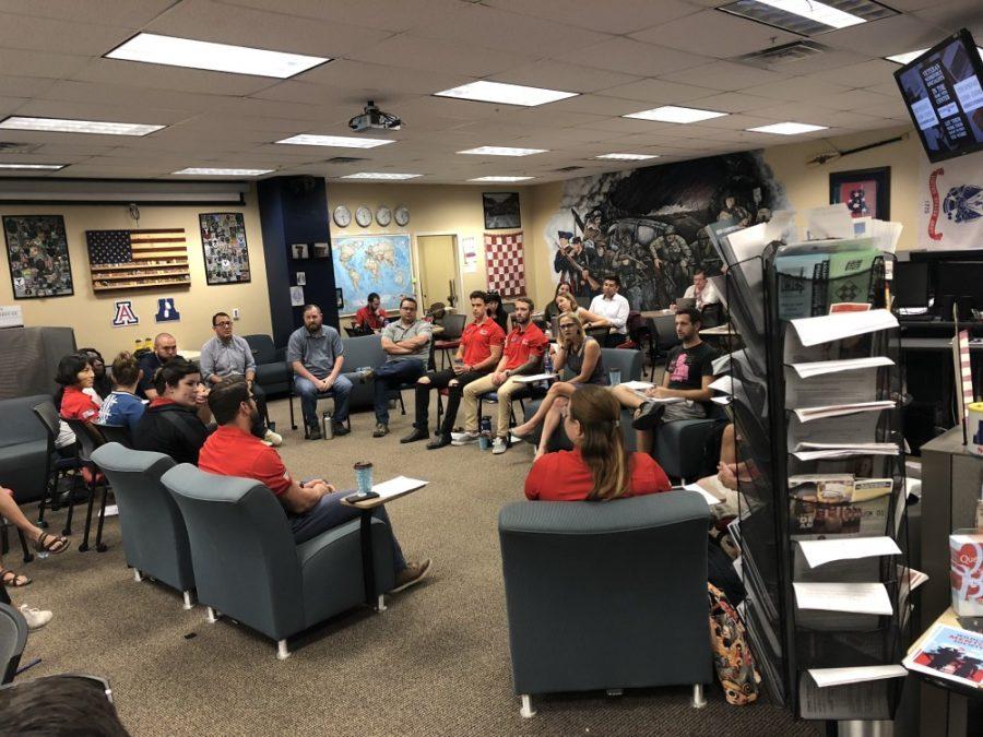 Congresswoman Kyrsten Sinema, center in gray dress, sat down with student-veterans on Thursday Oct. 4 in the Veterans Education & Transition Services office to discuss issues they face when interacting with the Department of Veterans Affairs.