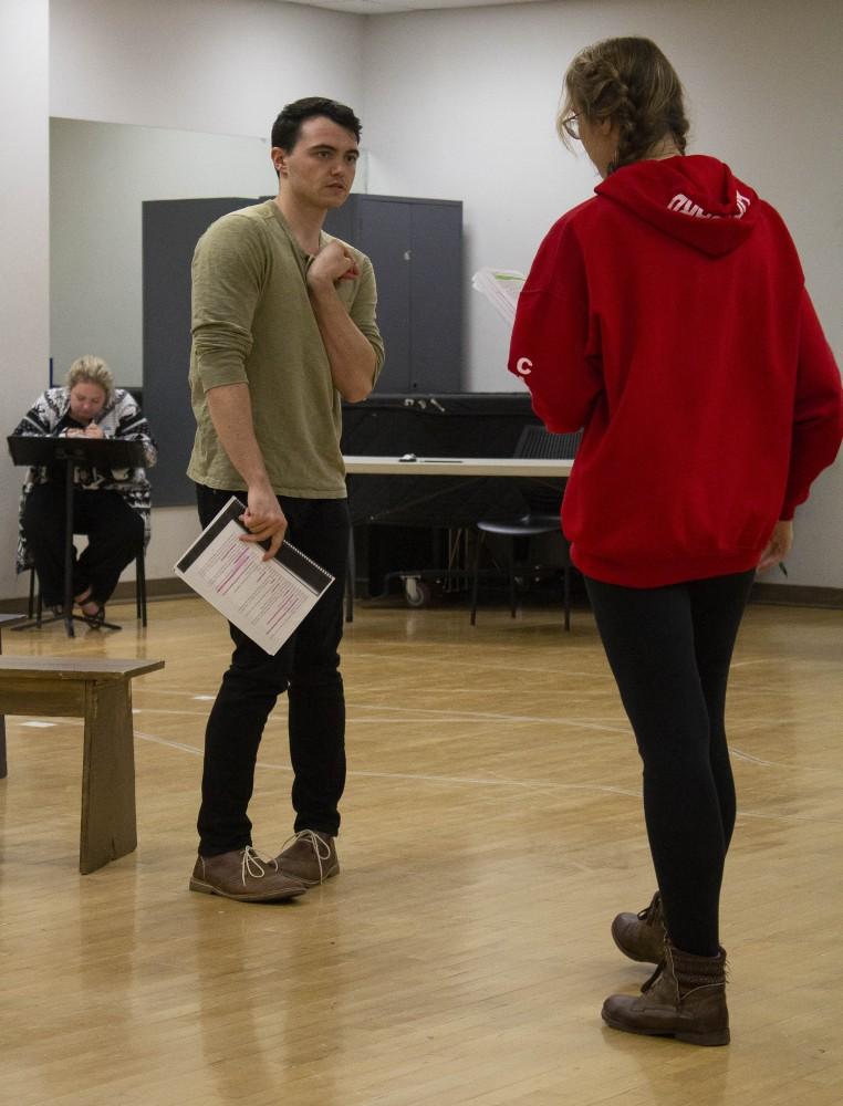 Dylan Cotter, left, and Elana Richardson, right, rehearse on Monday, Oct. 1 for The Cripple of Inishmaan. Cotter is playing the part of Billy Calven and Richardson that of Eileen.