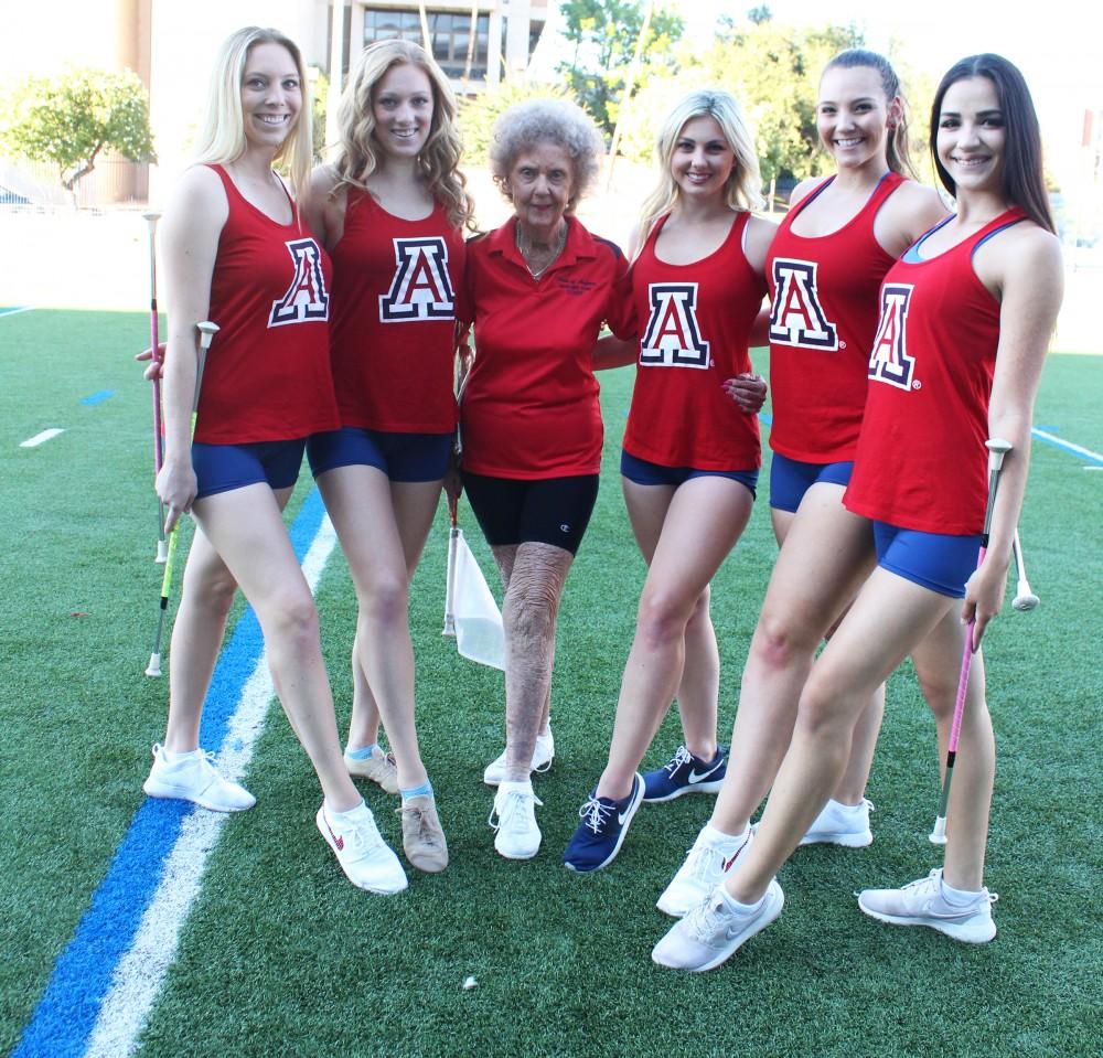 Shirlee Bertolini, Twirling Team Coach, has been associated with the UA Band program for over 60 years. Her current team includes Brianne Turnbull, Alexis Mendez, Allison Forbes, Brittany Lamers, and Matilda Higman.