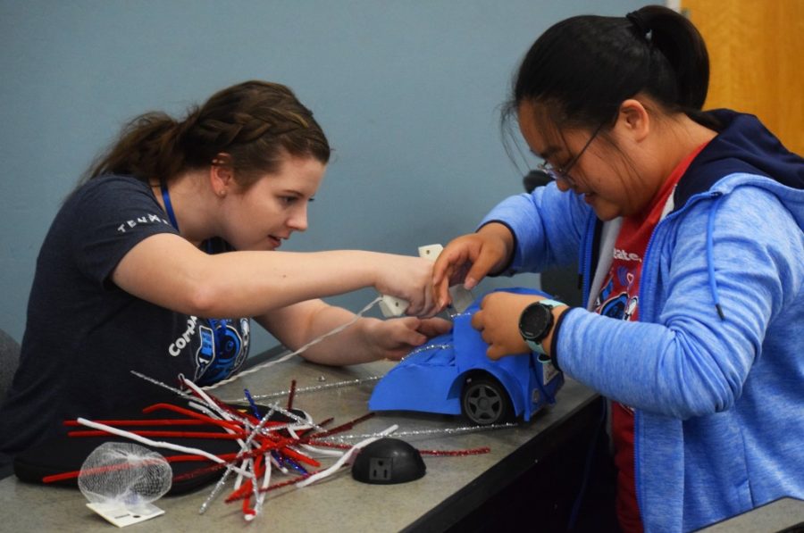 A team of hackathon participants putting the finishing touches on their NodeBot before the tournament. The Women’s Hackathon at the University of Arizona is the only non-competitive hackathon for women in the Southwest.
