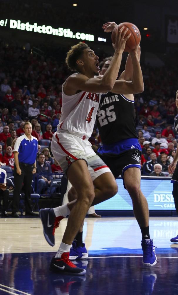 Arizona's Chase Jeter, 4, goes up for the layup during the Arizona-Chaminade exhibition game on Sunday, Nov. 4 at the McKale Center in Tucson, Ariz.