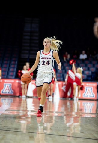 UA guard Bryce Nixon (24) dribbles the ball down the court during the first quarter of the Arizona-Western game at McKale Stadium on Monday, November 5, 2018, in Tucson, AZ.