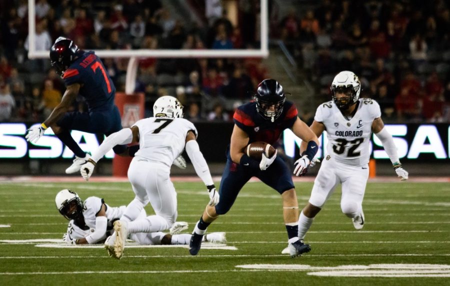 Tight-end Bryce Wolma (81) runs with the ball during the first quarter of the Arizona-Colorado game on Nov. 2, 2018 at Arizona Stadium in Tucson, Az. The Wildcats end the first leading 26-24.