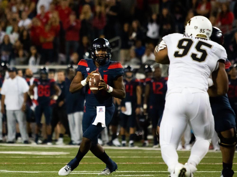 Arizona quarterback Khalil Tate (14) looks to throw the ball to his teammates during the third quarter of the Arizona-Colorado game at Arizona Stadium on Nov. 2, 2018 in Tucson Az. The final score was 42- 34 with the Wildcats taking home another win.