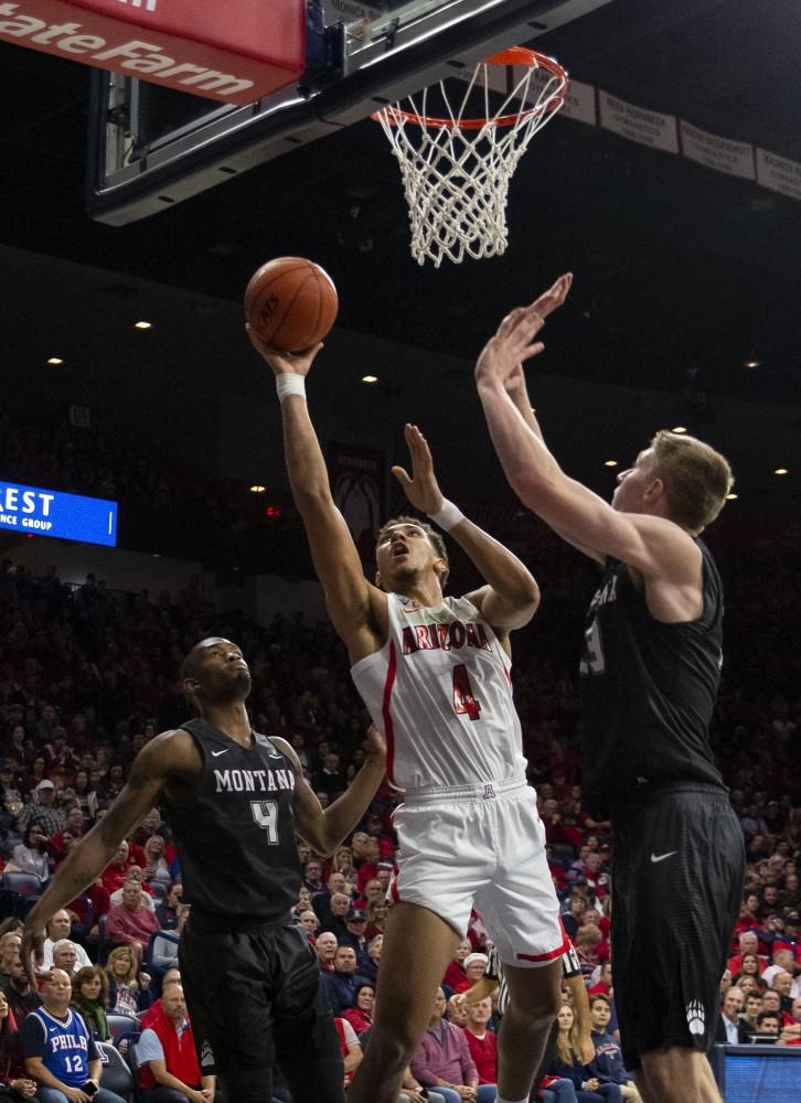 Arizona's Chase Jeter (4) goes up for a layup during the Arizona-Montana game on Wednesday, Dec. 19, 2018 at the McKale Center in Tucson, Ariz.