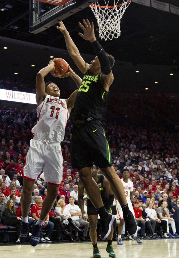 Arizonas Ira Lee (11) goes up for the shot during the Arizona-Baylor game on Saturday, Dec. 15 at the McKale Center in Tucson, Ariz.