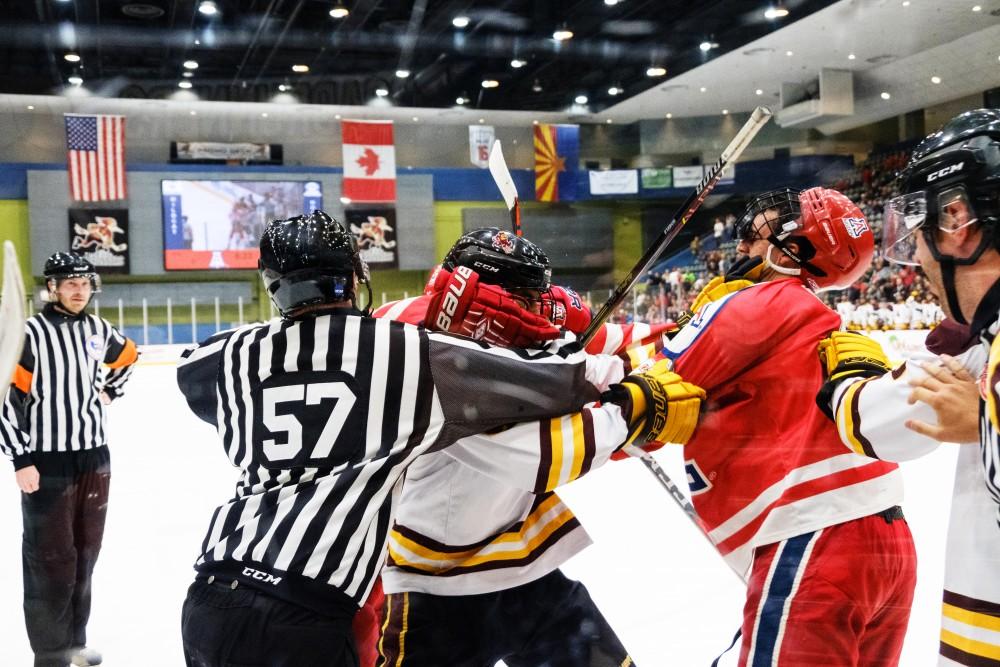 A fight breaks out between Arizona and ASU on Saturday in Tucson, Ariz.