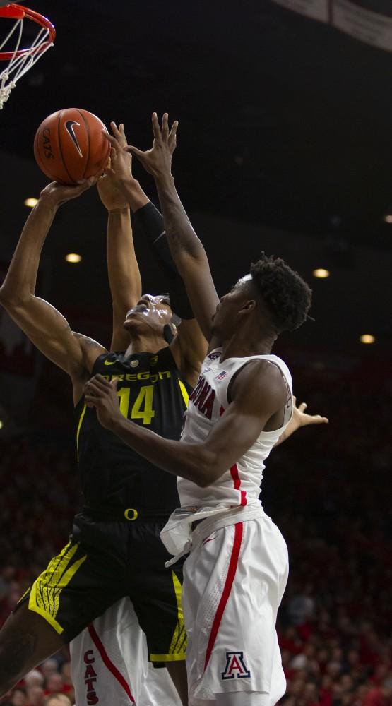 Oregon's Kenny Wooten (14) goes up for a lay up during the Arizona-Oregon game on Thursday, Jan. 17, 2019 at the McKale Center in Tucson, Ariz.