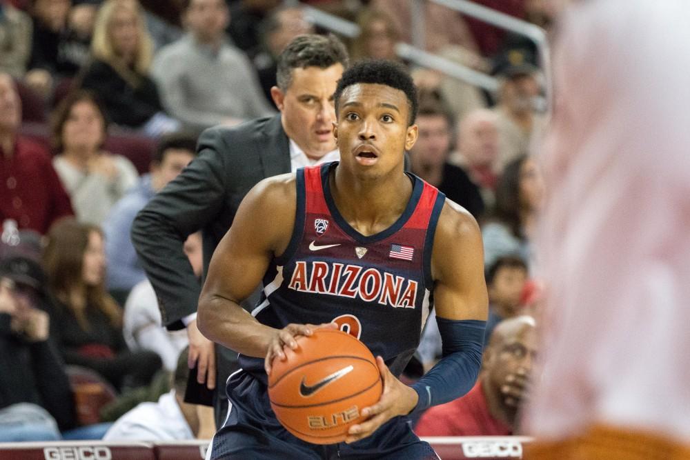 Brandon Williams looks to keep the ball moving for the Arizona Wildcats during the second half of the game vs USC on Thursday, January 24th.