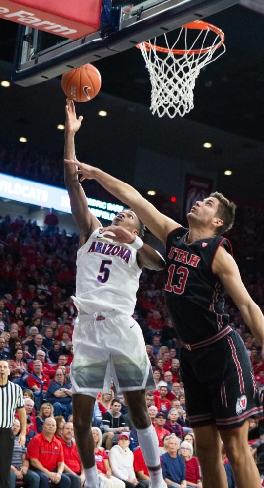 Guard Brandon Randolph (5) goes up for a shot during the game against Utah on Saturday, Jan. 5 at McKale Center. Arizona won the game 84-81. 