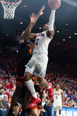 Guard Brandon Williams (2) shoots the ball during the game against Oregon State University on Saturday, Jan. 19 at McKale Center. Arizona won the game with a final score of 82-71. 