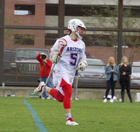 Arizona's attacker Connor Weissman trying to find a teammate to pass the ball to during the game against University of Southern California on Saturday, Feb. 9, 2019. The final score of the game was 10-9, a win for the Trojans.