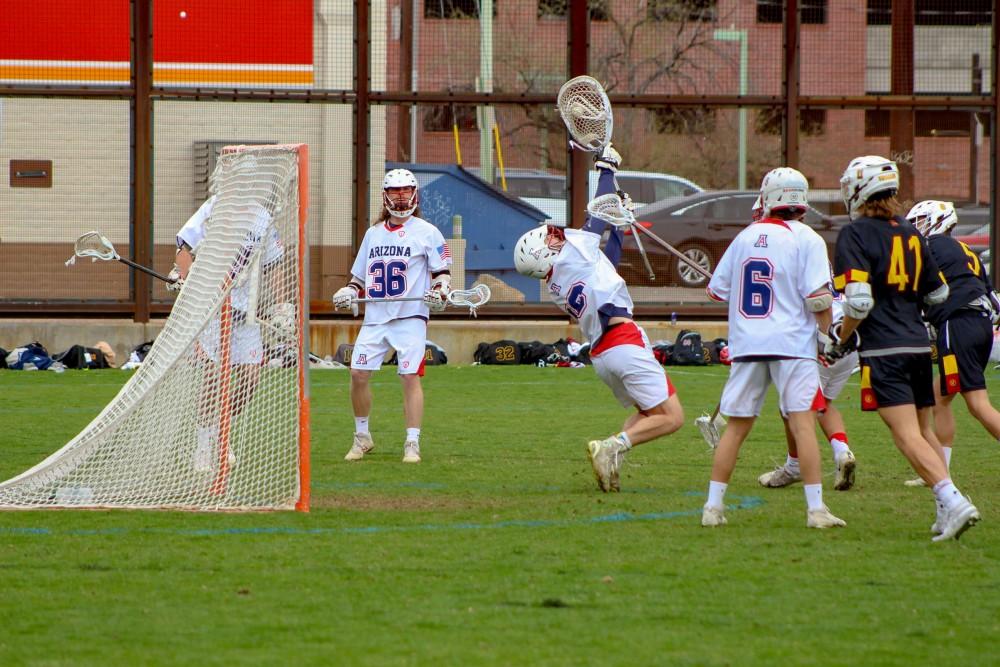Goalie, Wyatt Hill(#19) making a save during the game vs. USC. On Saturday February 10th, the wildcats lost to the California team on a 10-9 game, but Wyatt made over 10 saves.
