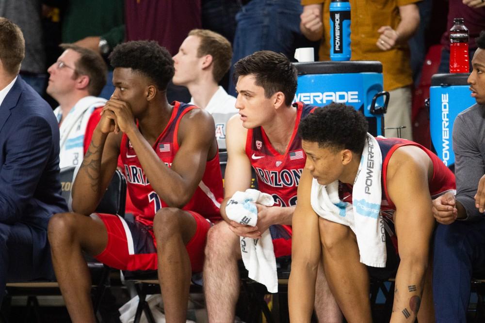 The bench players stressfully watch from the sidelines during the game against ASU on Thursday, Jan. 31 at Wells Fargo Arena. 