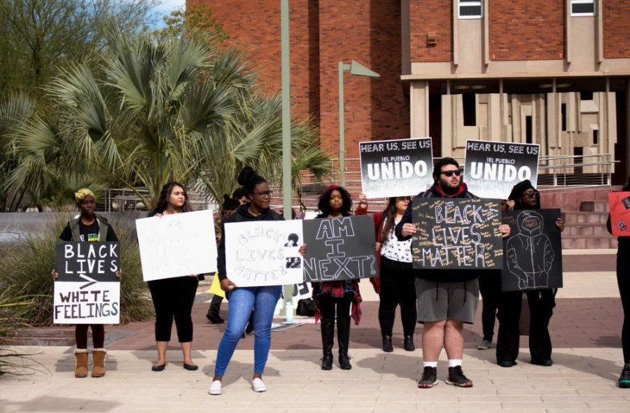 Member of the Black Student Union held a silent protest in honor of the anniversary of Trayvon Martins birthday. In his memory the BSU stand up against police brutality and injustice to their community. 