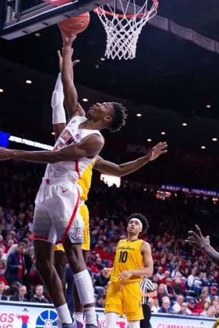 Guard Brandon Randolph (5) goes for a layup during the game against Cal on Thursday, Feb. 21 at McKale Center. Arizona defeated Cal 76-51.