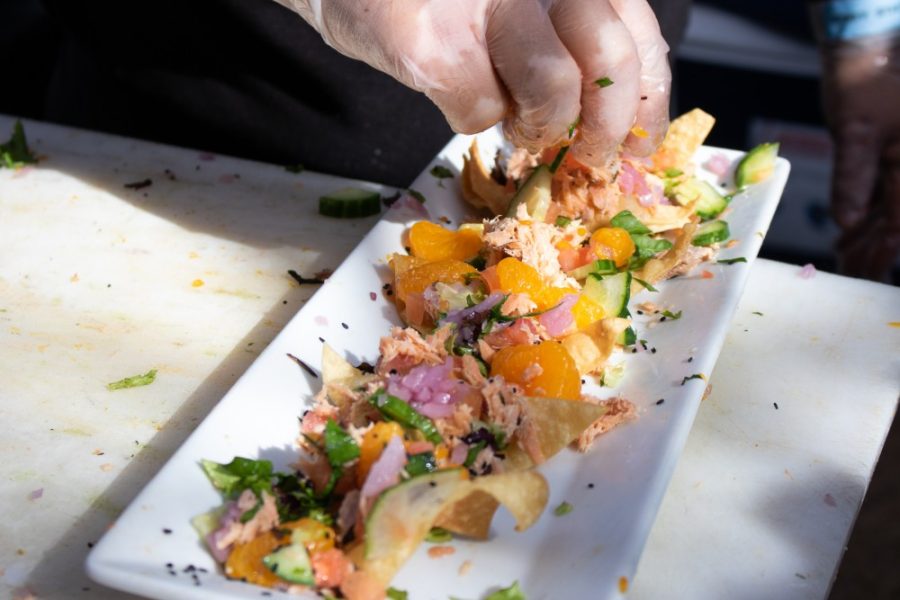 The Tohono Chul Garden vendor offers a smoked salmon salad on a tortilla chip at the 6th annual SAVOR Food and Wine Festival on Saturday, Feb. 2 at the Botanical Gardens. SAVOR featured many local vendors. 
