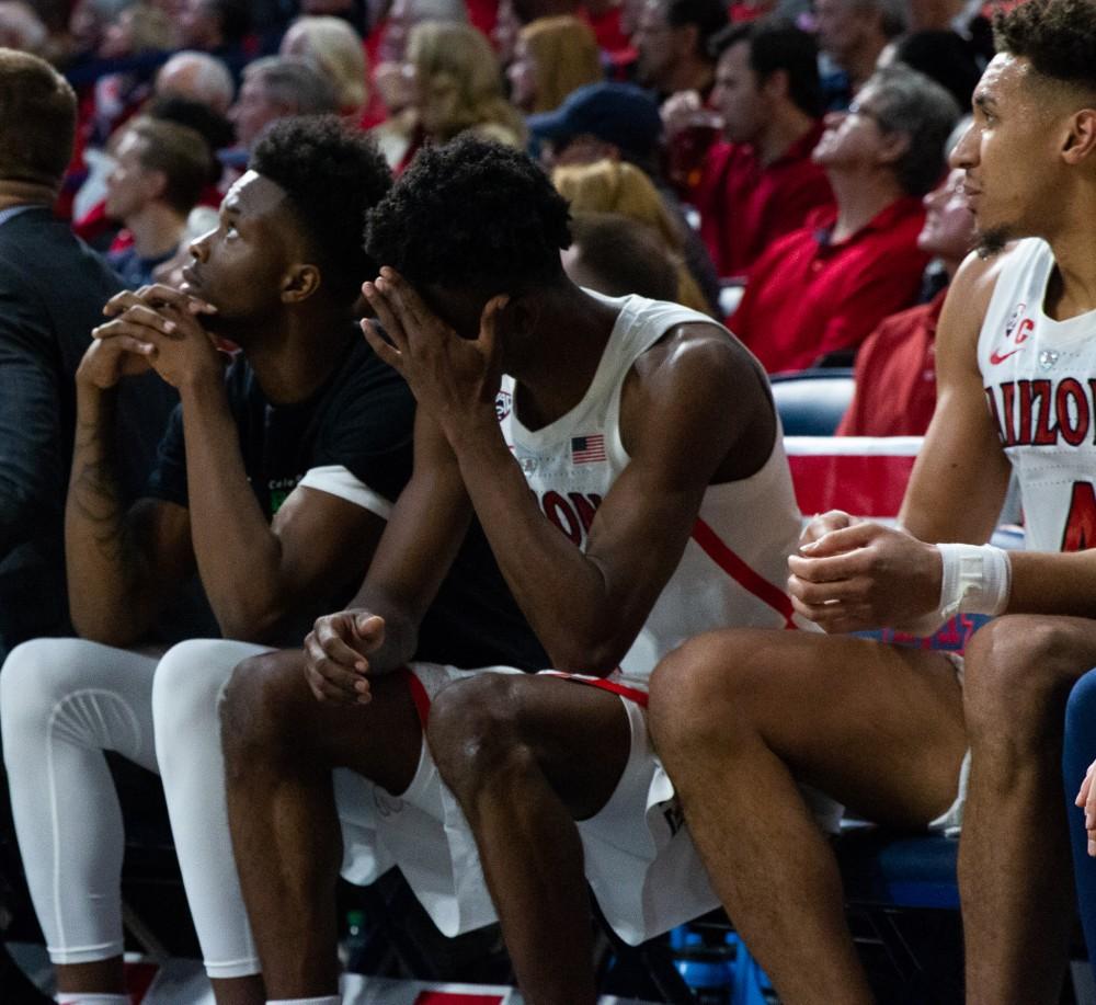 Players on the bench react to Arizona getting a foul during the game against Washington on Thursday, Feb. 7 at McKale Center. Arizona lost 67-60. 