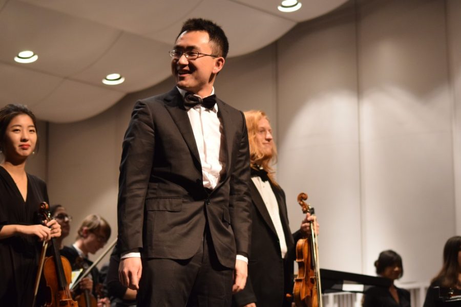 Minjun Dong after finishing his piano piece during the 46th annual President’s Concert at the University of Arizona. Dong’s piece was conducted by Yudai Ueda.