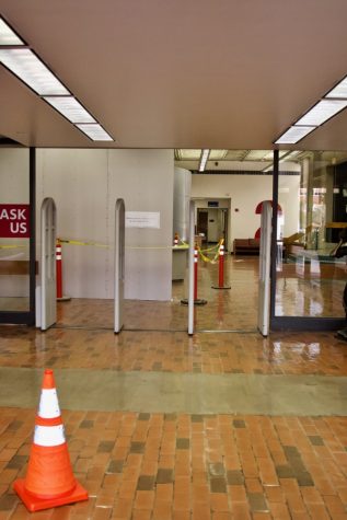 The main entrance of the Main Library on Sunday, Feb. 3, 2019 in Tucson, Ariz. Express check-in/out machines and computers are located to the West of the entrance.