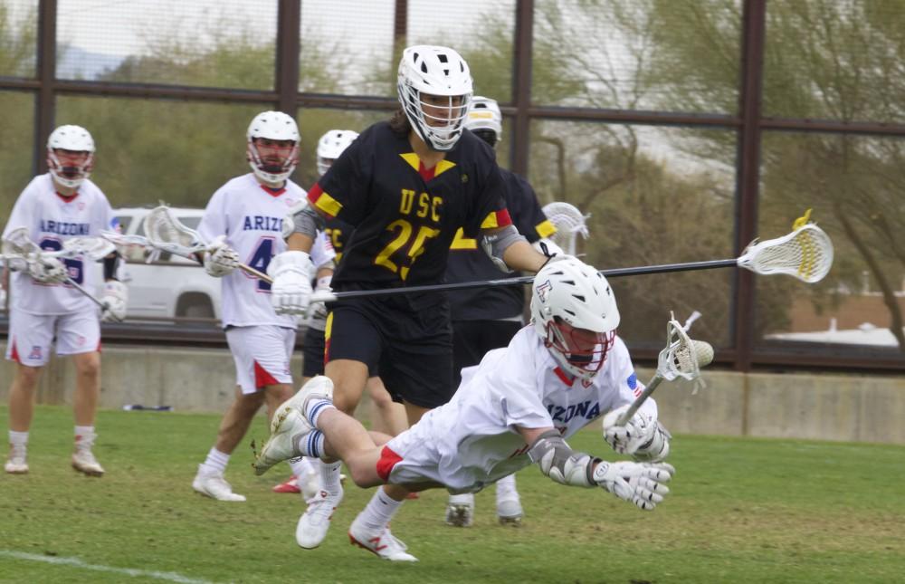 Arizona's attacker Foster Bundy stealing the ball from the Trojans during the game against University of Southern California on Saturday, Feb. 9, 2019. The final score of the game was 10-9, a win for the Trojans. 
