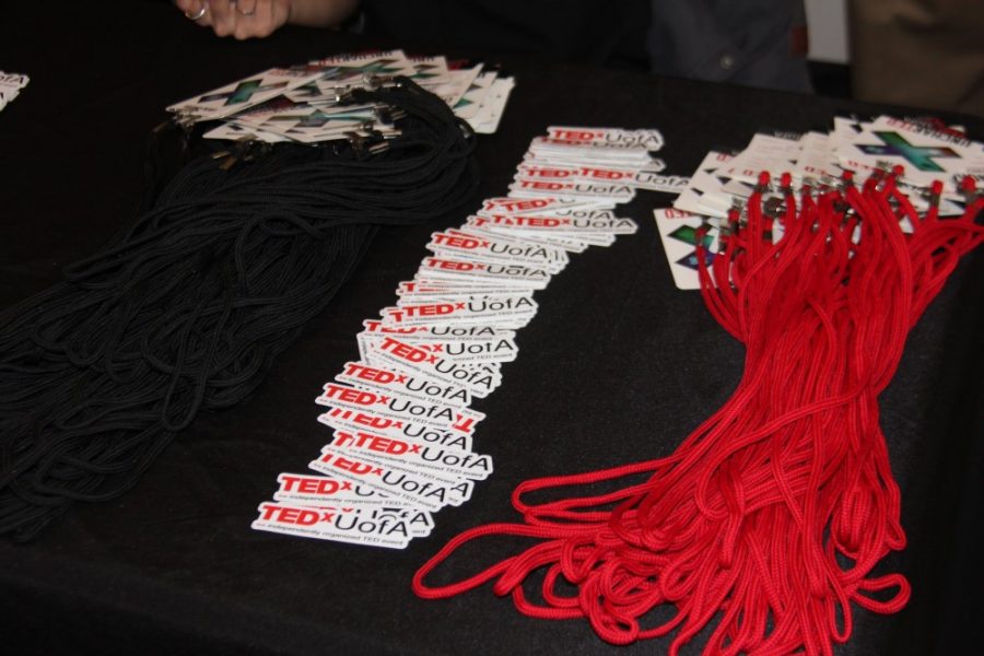 Stickers and lanyards from the 2018 TEDxUofA. The event will return to campus on Friday, March 15, 2019, in the ENR2 Building.
