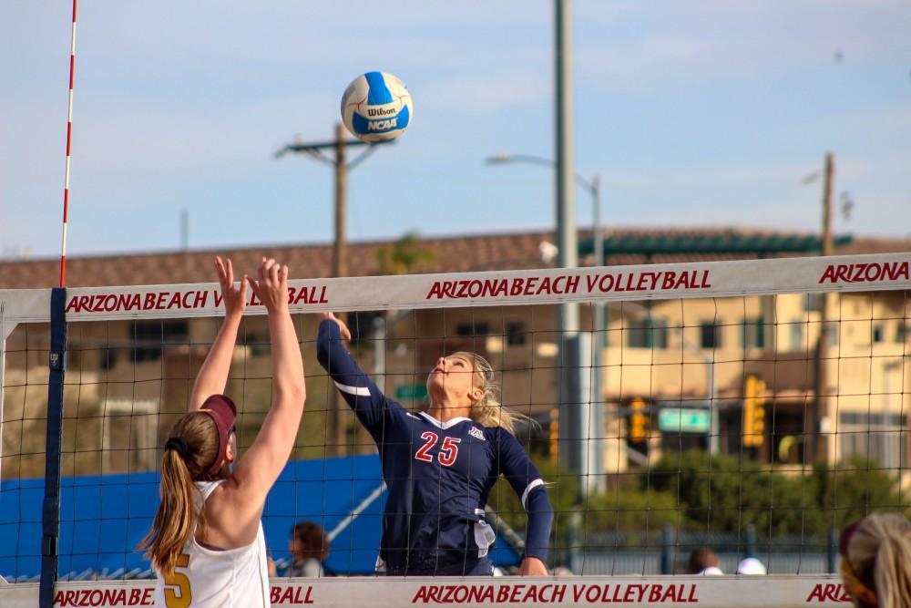 Caroline Cordes (#25) getting ready to spike the ball during the game vs. ASU. The Wildcats won Friday's game by a score of 3-2.
