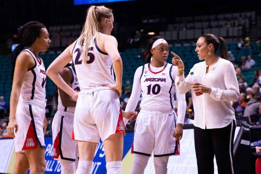 Womens basketball coach, Adia Barnes, meets with the players before the game against USC in the first round of the Pac-12 tournament on Thursday, March 7 at the Grand Garden Arena in Las Vegas, Nevada. Arizona won 76-48. 