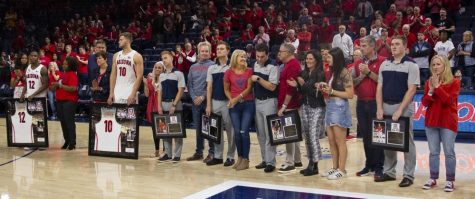 All seniors of the Arizona Men's basketball program stand with their families on senior night after the Arizona-Arizona State game on Saturday, March 9, 2019 at the McKale Center in Tucson, Ariz.